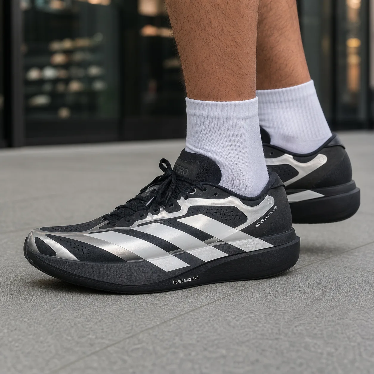 נעלי ריצה adidas Adizero Evo SL Exo שחור/כסף על הרגל